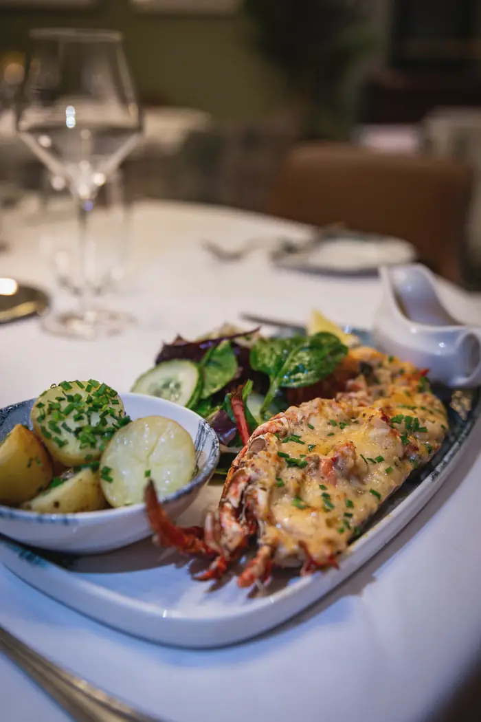 Lobster thermidor with salad and new potatoes